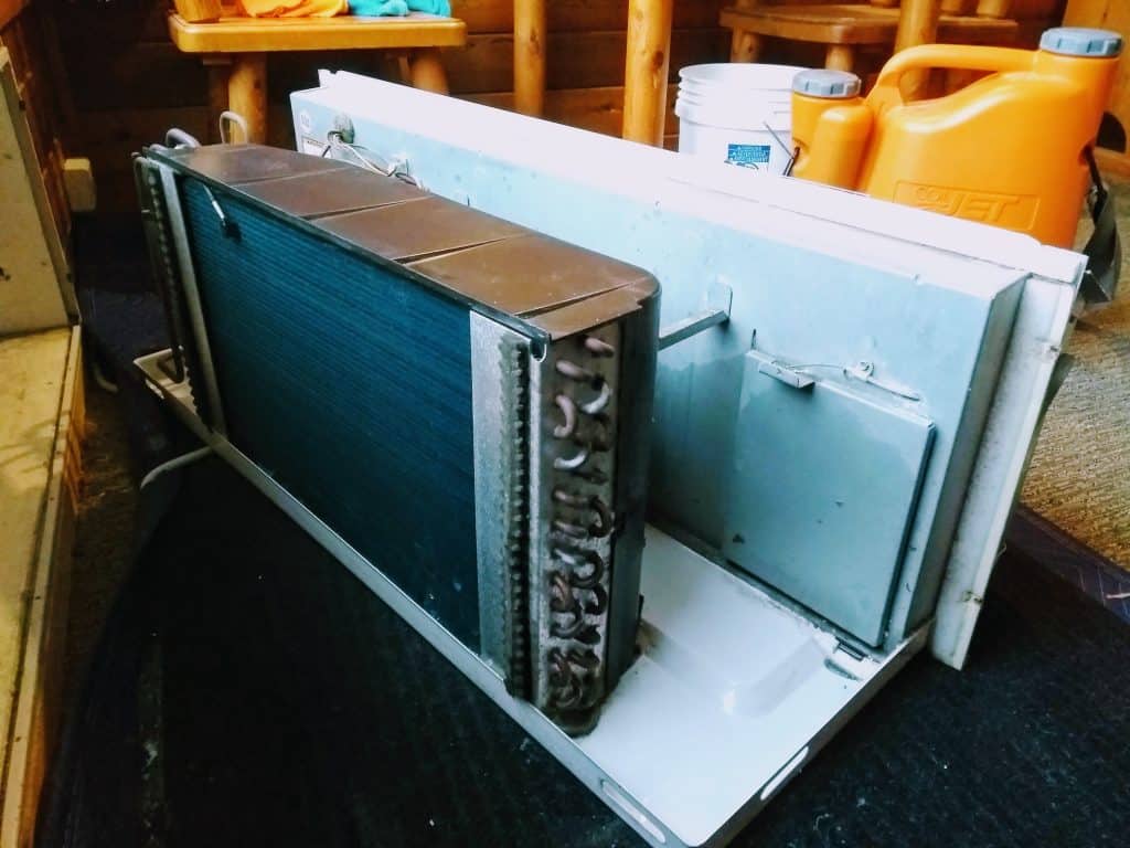 Moldy commercial PTAC unit before professional deep cleaning service Nova Scotia