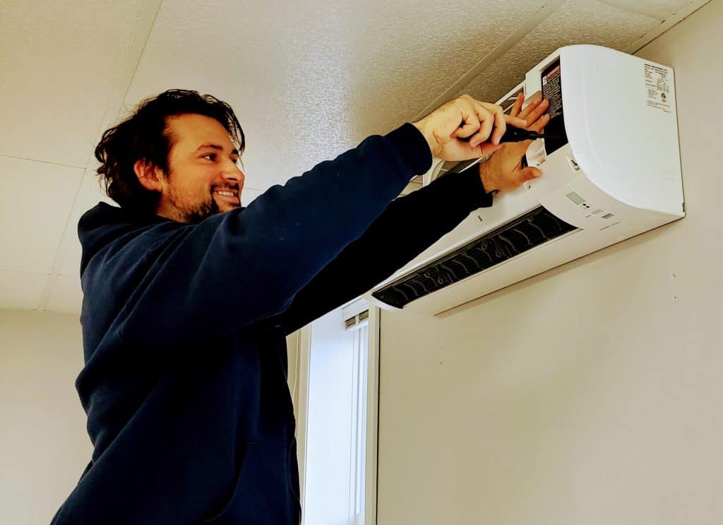 Pure Air Cleaning technician performing residential heat pump deep cleaning service Nova Scotia