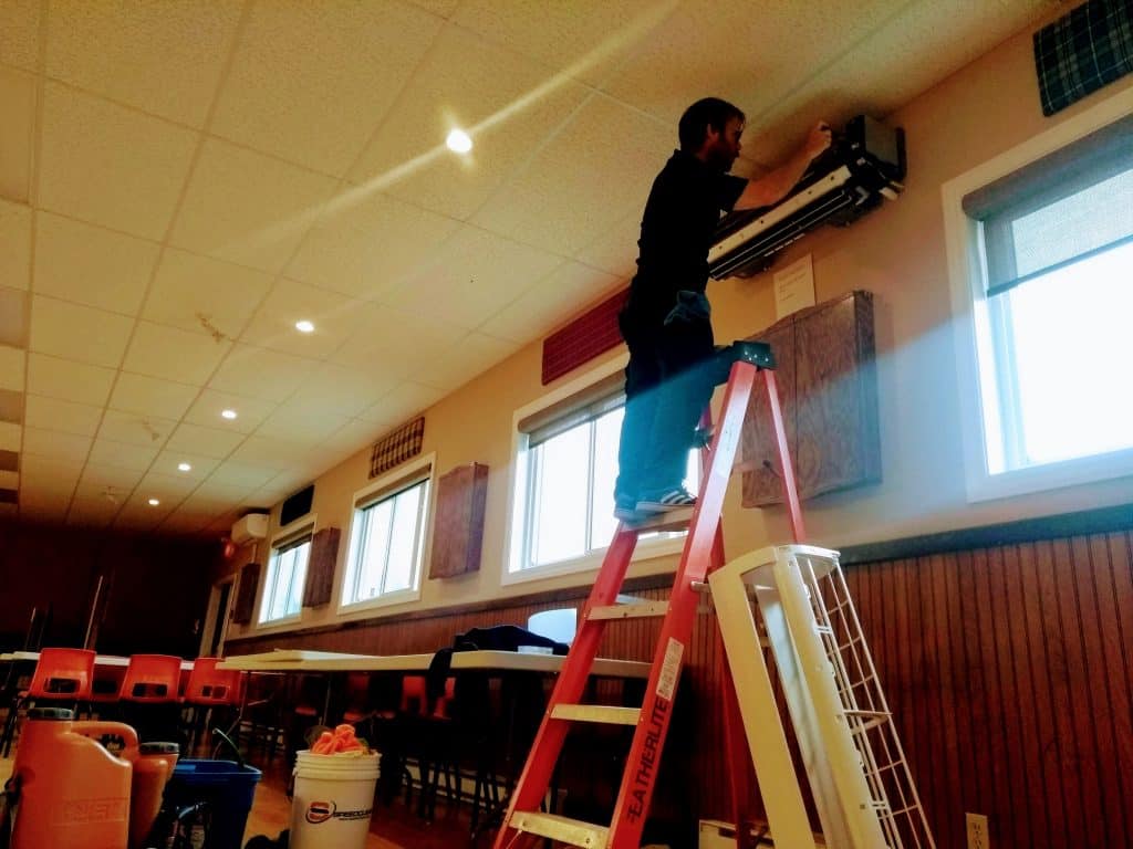 New Glasgow Heat Pump Cleaning Heat pump cleaning in community hall Pictou County Nova Scotia Pure Air