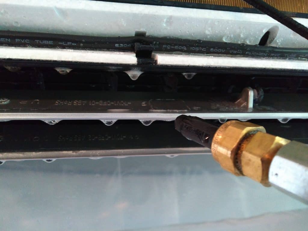 Heat pump being washed by Pure Air Cleaning Nova Scotia
