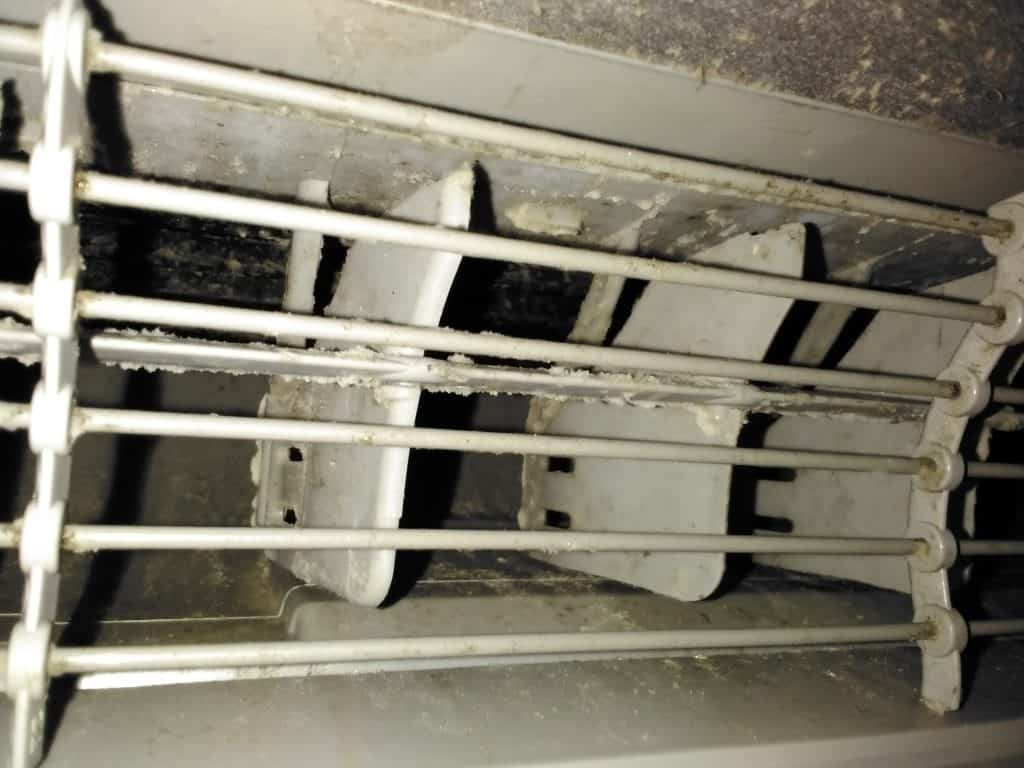 Ready for Summer? Why We Love Servicing Heat Pumps in New Glasgow & Pictou County Dirty mini split heat pump before cleaning New Glasgow